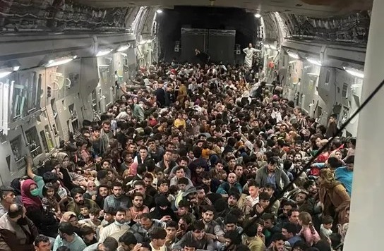Striking image appears to show 640 people fleeing Kabul in packed US military plane