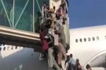 Taliban says ‘war is over’ as thousands flee Kabul